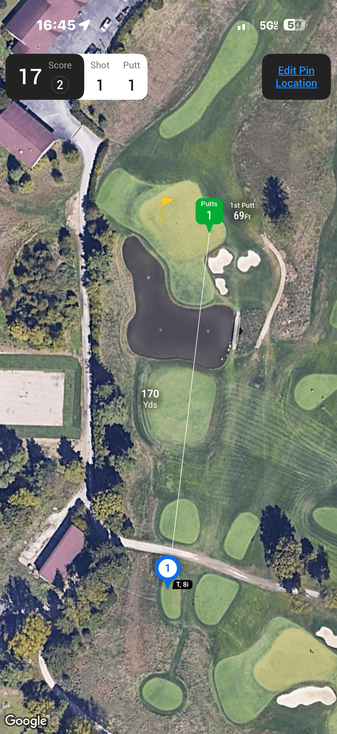 Aerial map view of the par-3 17th at Aronimink showing the water hazard and Aaron Rai's tee shot to 69 feet
